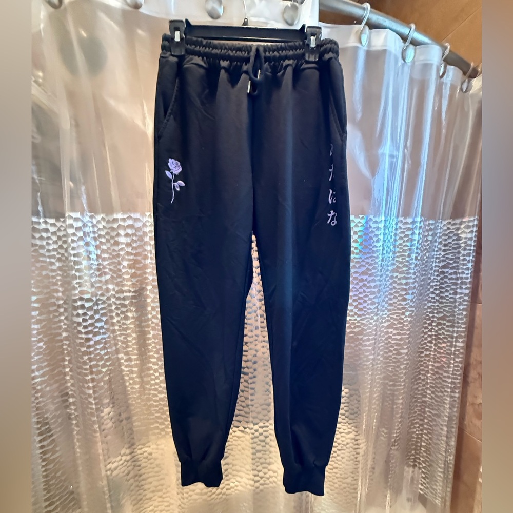 Black jogger size medium with purple design